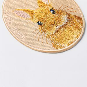 Close-up of the Netherland Dwarf rabbit pet charm by HACHI TAMA, showing detailed embroidery
