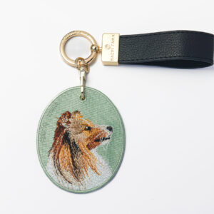 Rough Collie embroidered pet charm by HACHI TAMA with a leather strap
